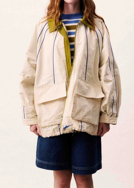 Oversized jacket with contrasting collar and visible stitching details
