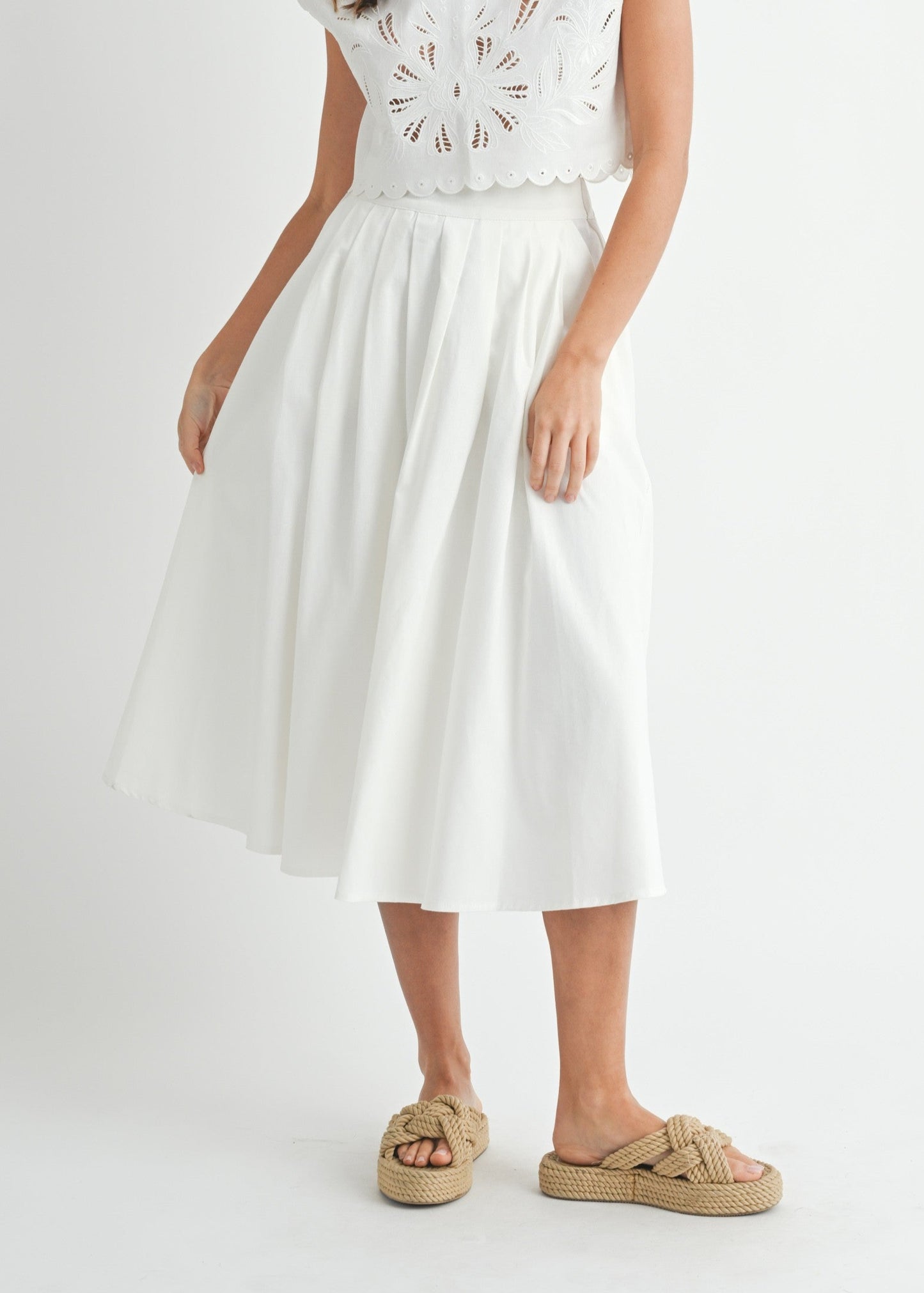 MABLE WHITE MIDI SKIRT – A CLEAN, LINEN-BLEND MIDI WITH A FLATTERING PLEATED WAIST AND STREAMLINED SILHOUETTE